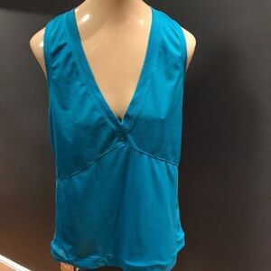 Nike turquoise vented V neck top, medium